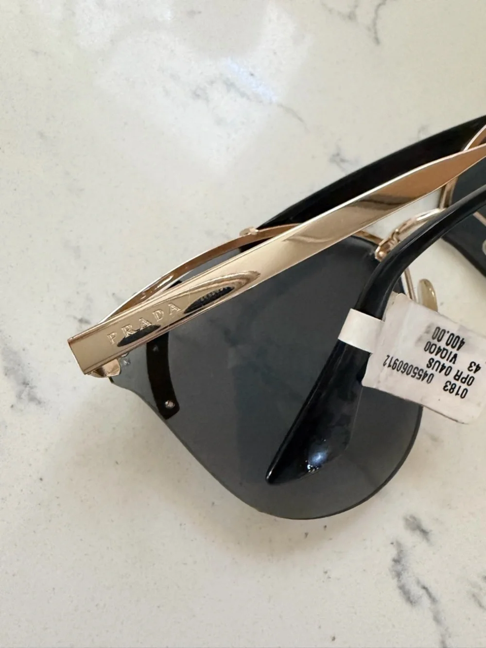 Prada Men's Black and Gold Rimless Shield Sunglasses - Picture 2 of 4